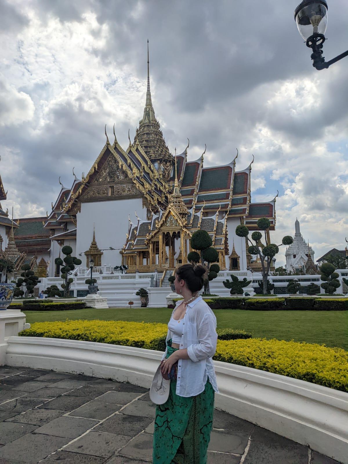 Tiani standing at the grand palace in bangkok. 