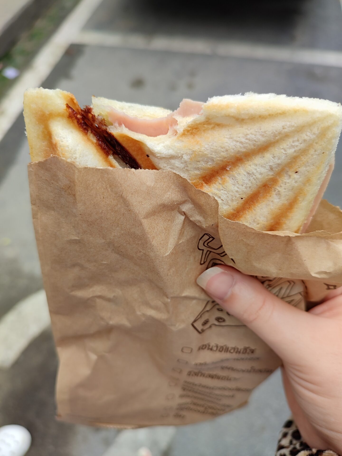 cheese and ham toastie from 7/11. cost of 5 nights in Bangkok