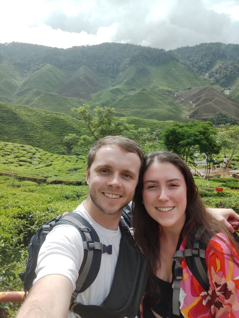 Having a lovely weekend in the Cameron Highlands. This is a picture of Tiani and Brett with tea plantations in the background.